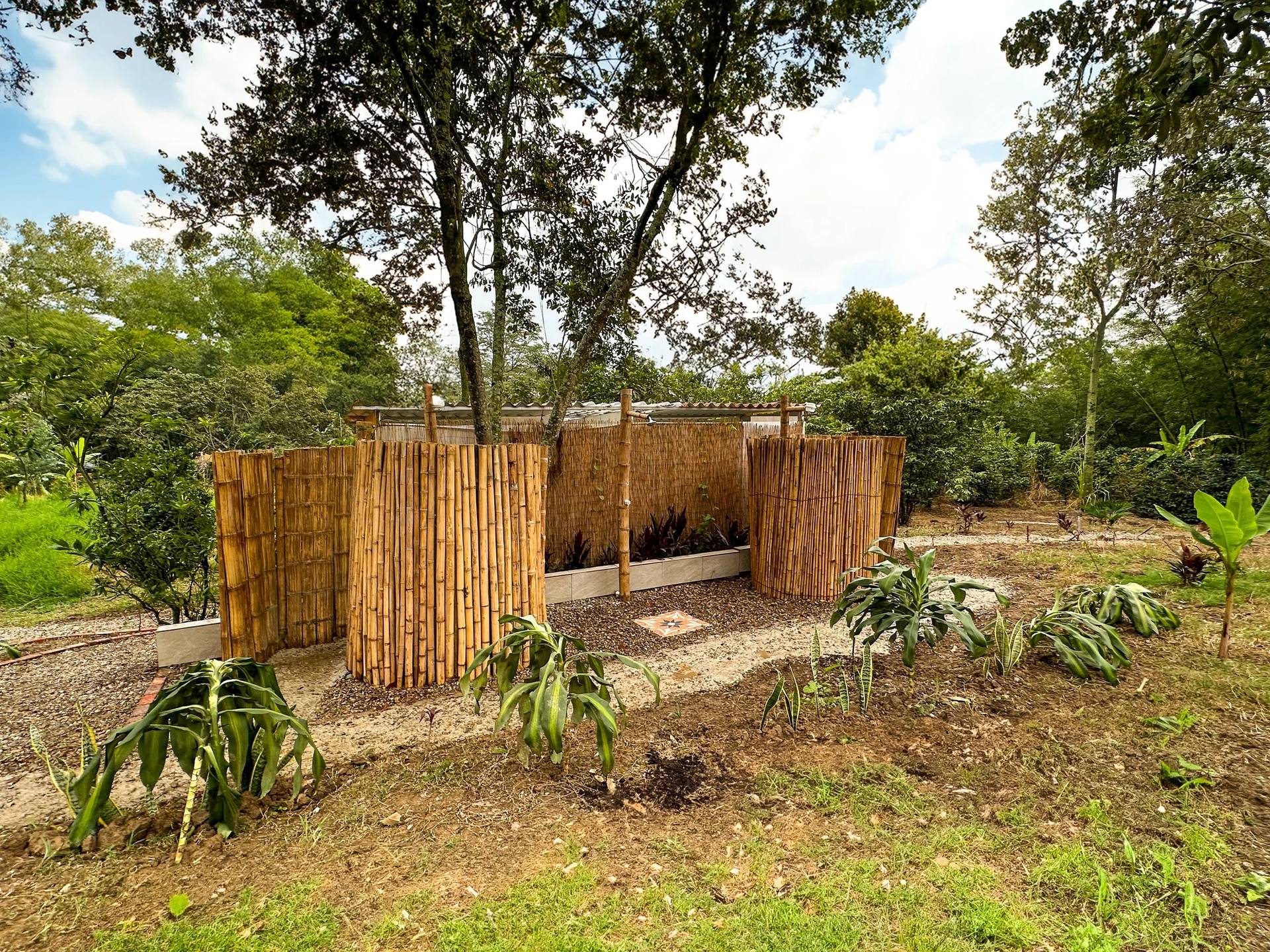 Outdoor showers in the camping area at El Nido Andino, La Mesa, Cundinamarca